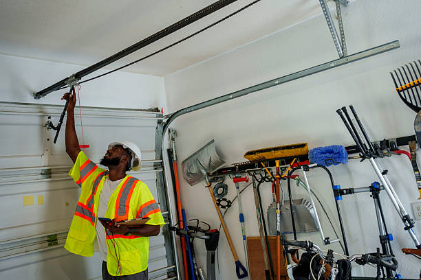 Professional Garage Door technician working in Waltham, MA